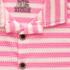 pink boys shirt closeup