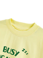 Pastel Yellow Garfield Busy Doing Nothing Graphic T-Shirt for Girls