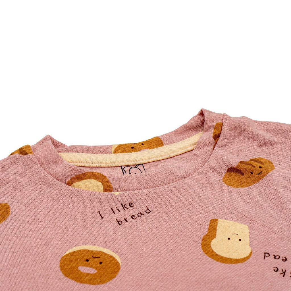 bread printed baby clothing set closeup