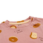 bread printed baby clothing set closeup
