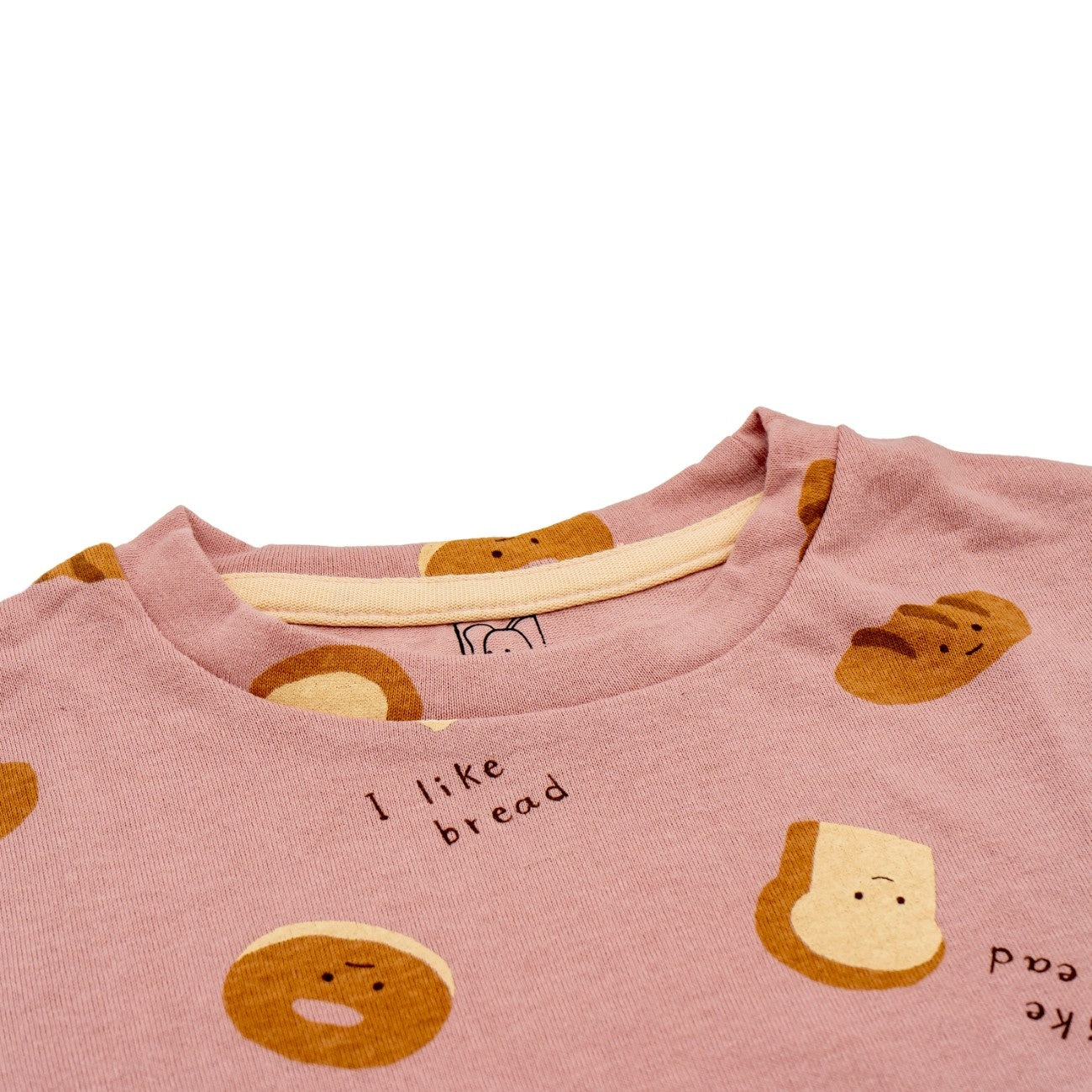 bread printed baby clothing set closeup