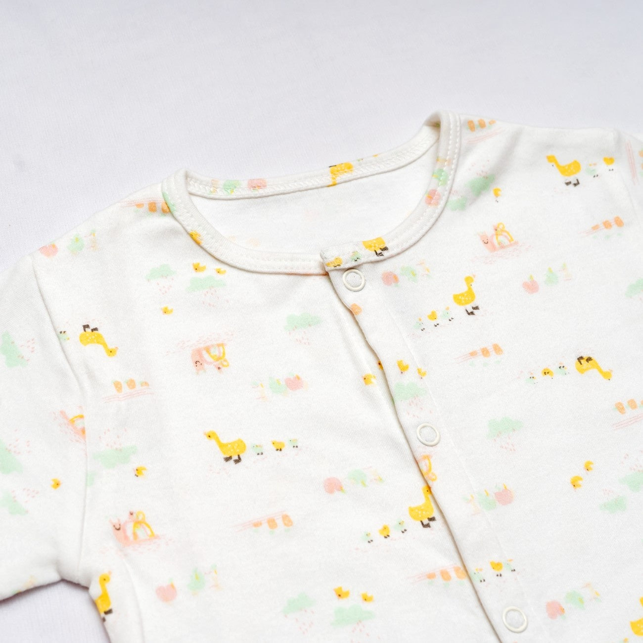 duck printed cotton baby clothes white closeup