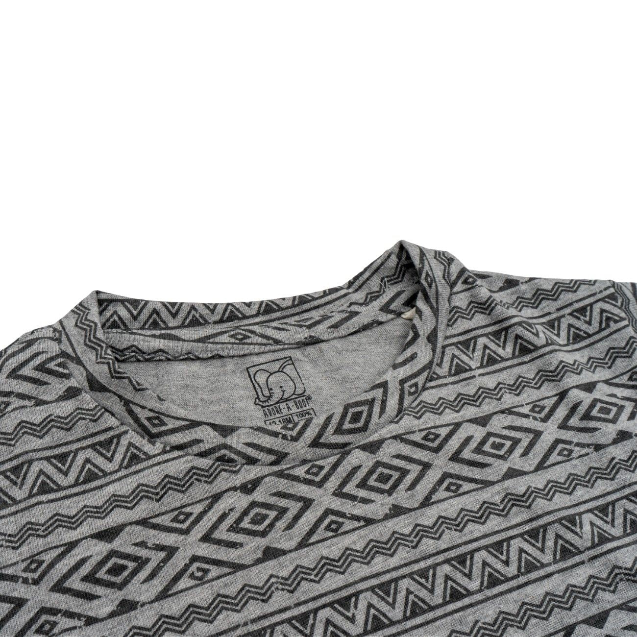 geometrical printed baby clothing set closeup