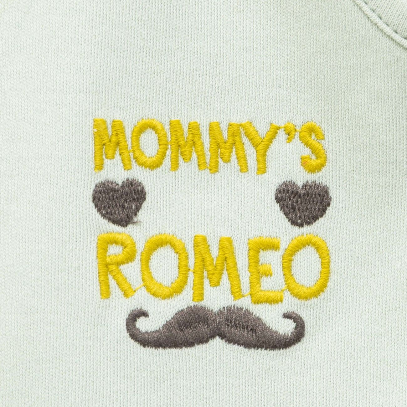 green baby boy dress set closeup