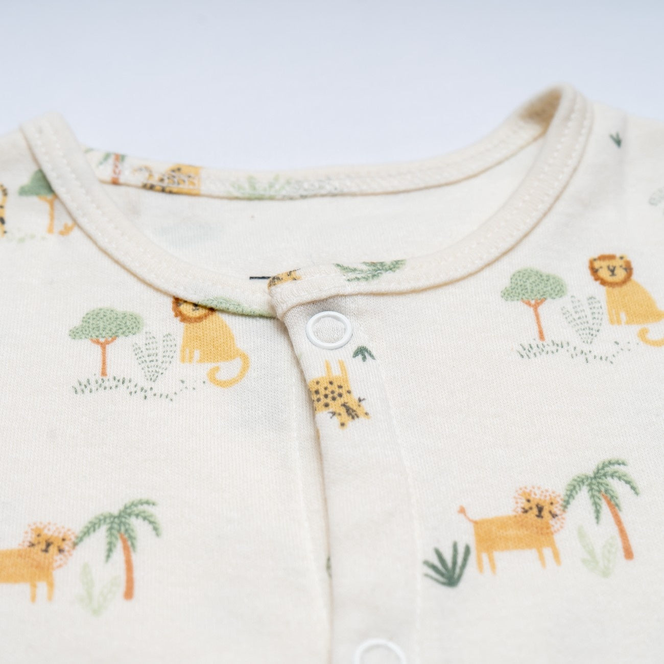 lion and tiger printed cotton baby clothes closeup