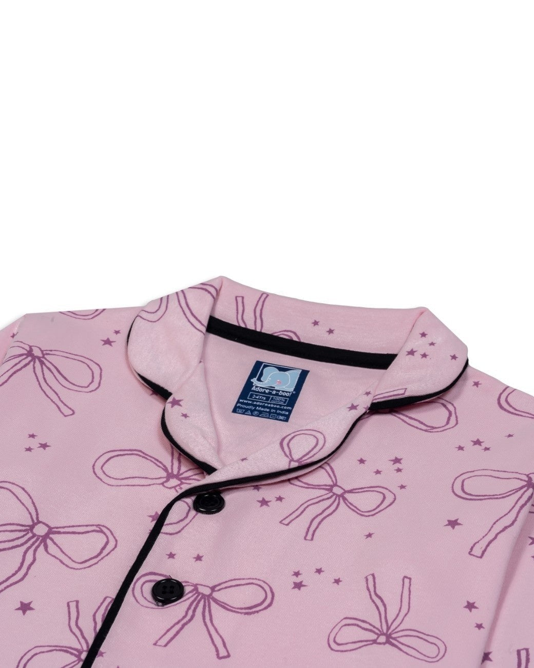 ribbon printed kids night wear closeup